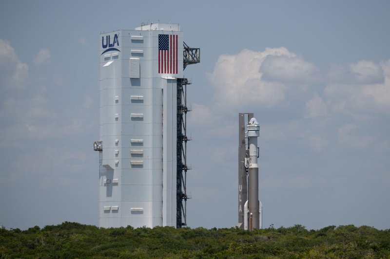 A United Launch Alliance (ULA) Atlas V rocket with Boeing's CST-100 Starliner spacecraft aboard is rolled back to the vertical integration facility to replace a pressure regulation valve on the Atlas V rocket, at Cape Canaveral Space Force Station in Florida on Wednesday, May 8. NASA's first Boeing Crew Flight Test was delayed to May 25 to further assess a helium leak. NASA Photo by Joel Kowsky/UPI