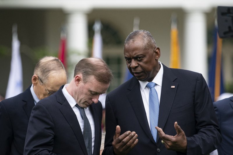 Secretary of Defense Lloyd Austin (R) speaks with National Security Adviser Jake Sullivan at an arrival ceremony for Kenyan President William Ruto on Thursday. The Pentagon on Friday said Austin is set to undergo a "minimally invasive procedure" related to a bladder issue he had in January and that the White House has been notified. Photo by Al Drago/UPI