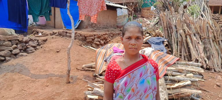 Coffee farmer Gemmala Sita, whose beans reach cafes in global capitals — even as she must struggle without a toilet [Gurvinder Singh/Al Jazeera]