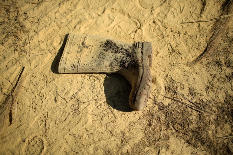 OHANNESBURG, SOUTH AFRICA - JULY 15: A old boot is discarded at a mine dump on July 15, 2013 in Johannesburg, South Africa. Johannesburg became the centre of gold mining in 1886 when gold was first discovered. Two government officials were sent to establish a settlement and named it Johannesburg after the first name they both shared. The gold rush lasted for over 100 years. The South African mining industry has shed more than 340,000 jobs since 1990 but is still the fifth largest gold producer in the world and has vast amounts of other minerals still to be unearthed. (Photo by Christopher Furlong/Getty Images)