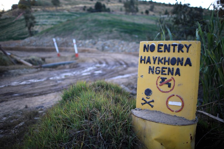 JOHANNESBURG, SOUTH AFRICA - JULY 16: A warning sign guards the entrance to to old mine dumps at Crown Mines on July 16, 2013 in Johannesburg, South Africa. Johannesburg became the centre of gold mining in 1886 when gold was first discovered. Two government officials were sent to establish a settlement and named it Johannesburg after the first name they both shared. The gold rush lasted for over 100 years. The South African mining industry has shed more than 340,000 jobs since 1990 but is still the fifth largest gold producer in the world and has vast amounts of other minerals still to be unearthed. (Photo by Christopher Furlong/Getty Images)