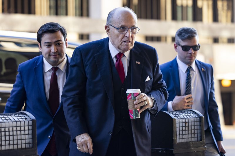 Former attorney for former President Donald Trump Rudy Giuliani (C), remotely attended his arraignment hearing Tuesday in Maricopa County Superior Court and pleaded not guilty to nine felony charges accusing him of conspiring to overturn the 2020 election results in Arizona. File Photo by Jim Lo Scalzo/EPA-EFE