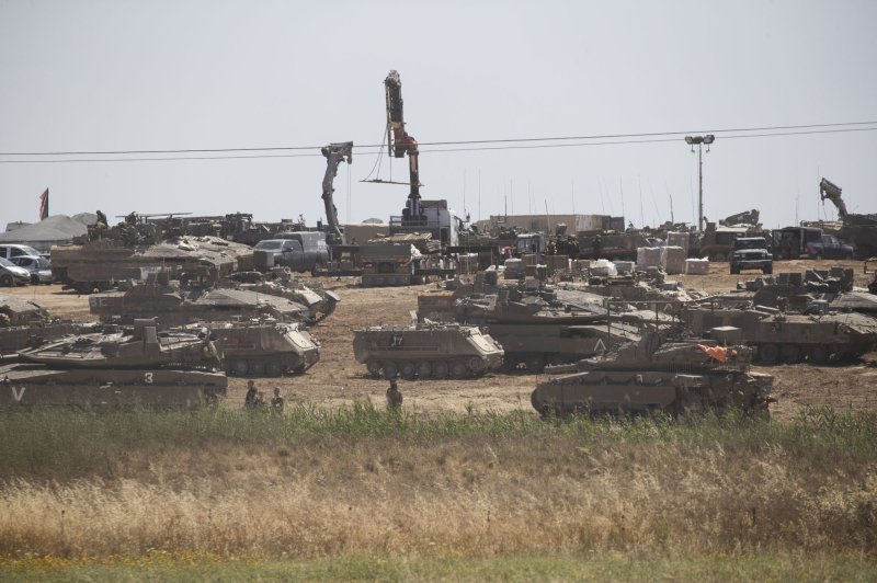 Israeli bombing inside Rafah in southern Gaza Strip as seen from inside southern Israel on Tuesday. Israel said Wednesday that the Kerem Shalom Crossing in southern Gaza was re-opened. Photo by Jim Hollander/UPI