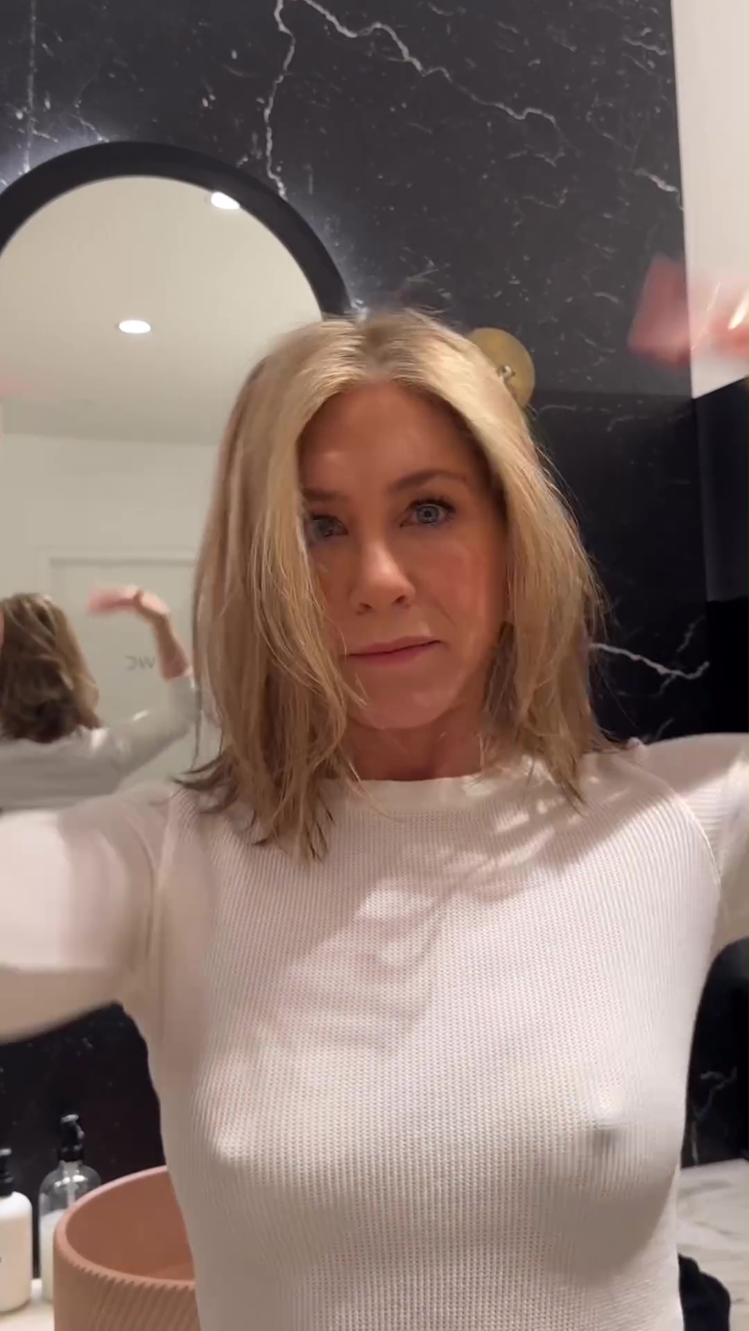 Jennifer Aniston shared a new video promoting hair products