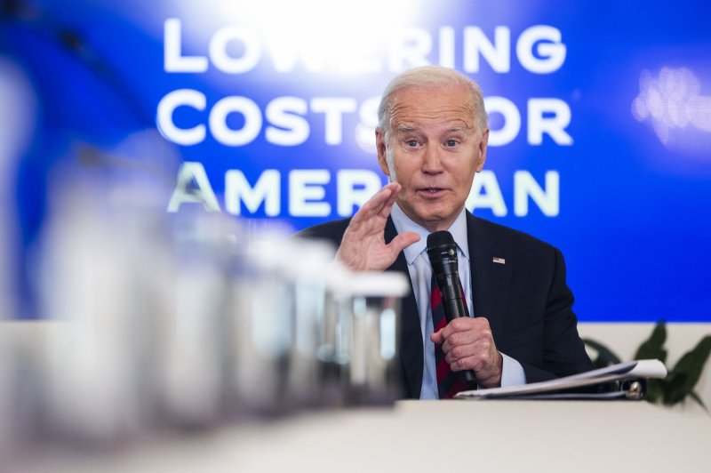 President Joe Biden first announced the rule in March that would have taken effect Tuesday and would have cut fees from an average of $32, according to the U.S. Consumer Financial Protection Bureau. File Photo by Jim Lo Scalzo/UPI