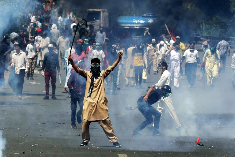 PTI has maintained that the riots on May 9 were part of a "false flag" operation against the party. [Rahat Dar/EPA]