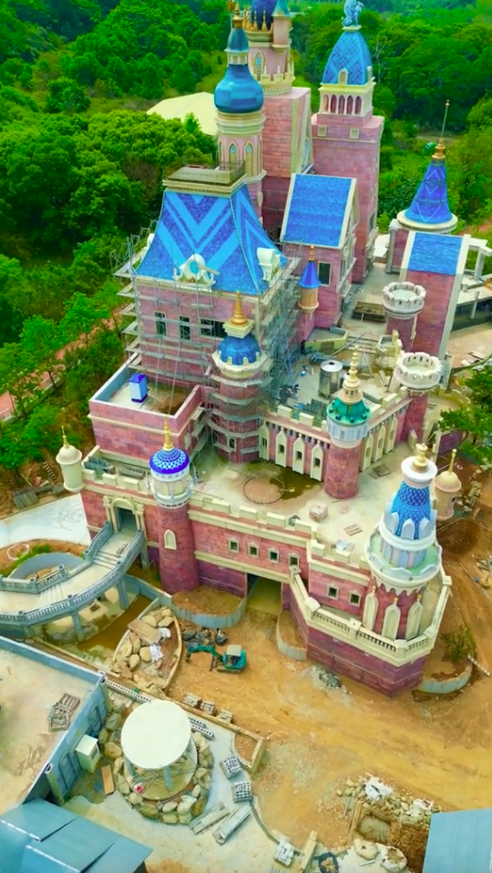 The incredible blue and pink castle will pump out sweets while visitors roam around