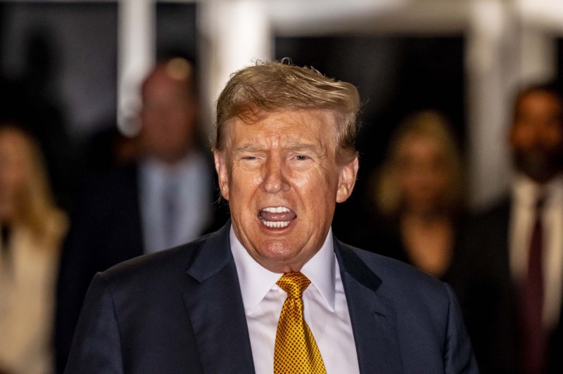 Former President Donald Trump speaks to reporters at Manhattan Criminal Court in New York on Tuesday, May 21, 2024. He was booed while speaking at the Libertarian party's national convention. Pool Photo by Mark Peterson/UPI