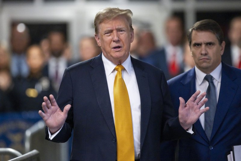 Former President Donald Trump speaks to reporters as he arrives for his trial at Manhattan Criminal Court in New York on May 21. Closing arguments are scheduled to start Tuesday in the felony trial charging Trump with making illegal hush-money payments to adult film actress Stormy Daniels in 2016. Pool photo by Justin Lane/UPI