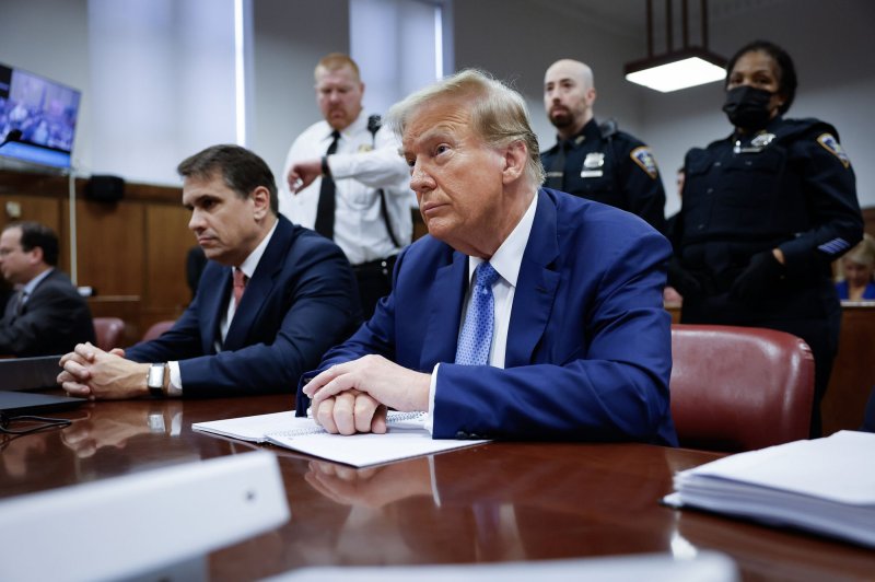 Former President Donald Trump sits in the courtroom during his hush money trial at Manhattan Criminal Court on Monday in New York City.Pool Photo by Michael M. Santiago/UPI