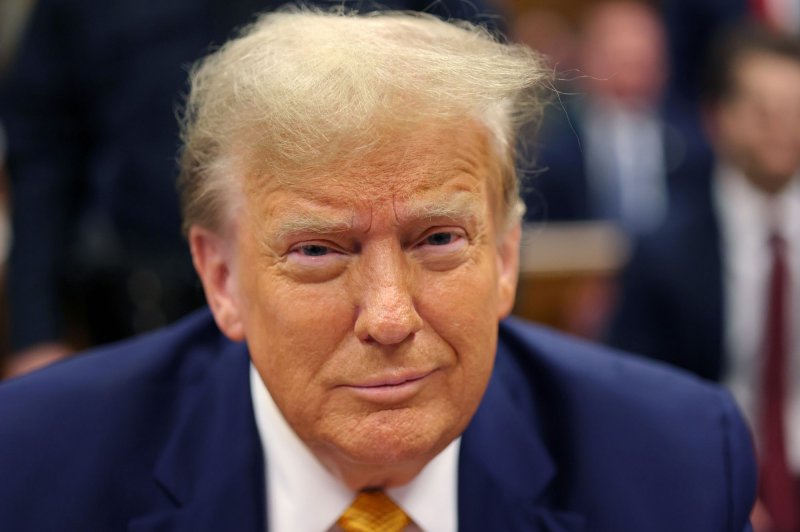 Former President Donald Trump sits in the courtroom at Manhattan Criminal Court in New York on Tuesday. Before entering Judge Juan Merchan’s court room and accompanied by House Speaker Mike Johnson, Trump told a crowd of reporters “there’s no crime.” Pool photo by Michael M. Santiago/UPI