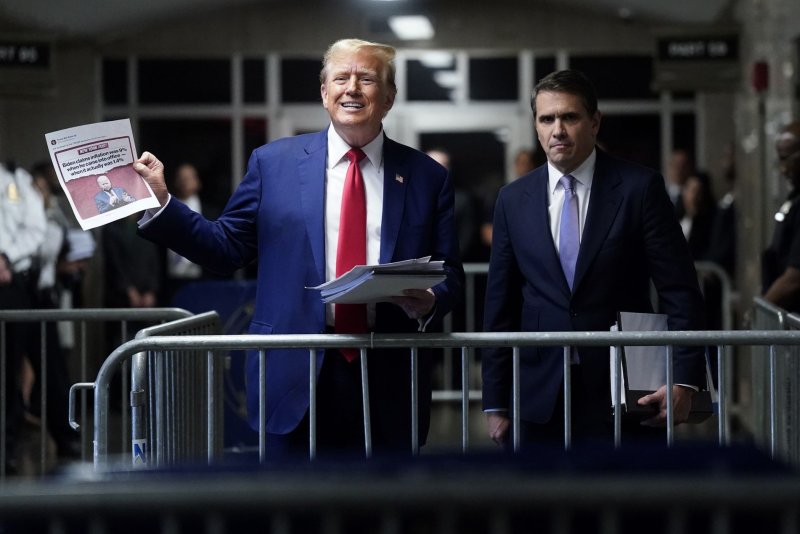 Former President Donald Trump speaks to reporters as he leaves for the day at Manhattan criminal court in New York on Friday, May 10, 2024. Trump's criminal trial is in its fourth week on charges he allegedly falsified business records to cover up a sex scandal during the 2016 presidential campaign. Pool photo by Timothy A. Clary/UPI