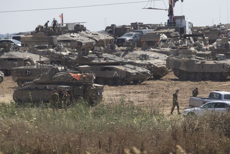 Israeli bombing inside Rafah in southern Gaza Strip as seen from inside southern Israel last Tuesday. Israel entered Rafah and took over the Keren Shalom crossing May 6 in what appeared to be a "limited" ground offensive against Hamas. On Monday, the United Nations said 360,000 people have fled Rafah. Photo by Jim Hollander/UPI