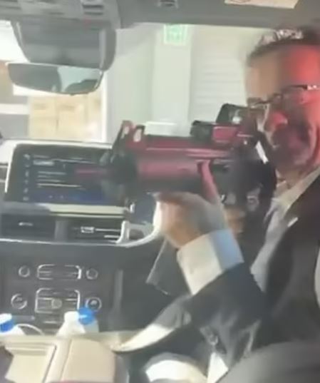 The horror moment British ambassador to Mexico, Jon Benjamin, points an assault rifle at a terrified member of staff