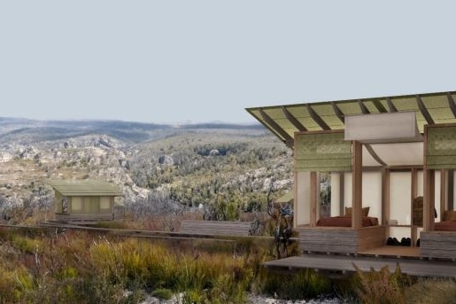 Bush huts in a pagoda landscape.