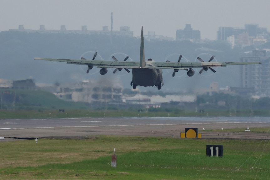 A Taiwan Air Force C-130 aircraft takes off at Hsinchu Air Base in Hsinchu