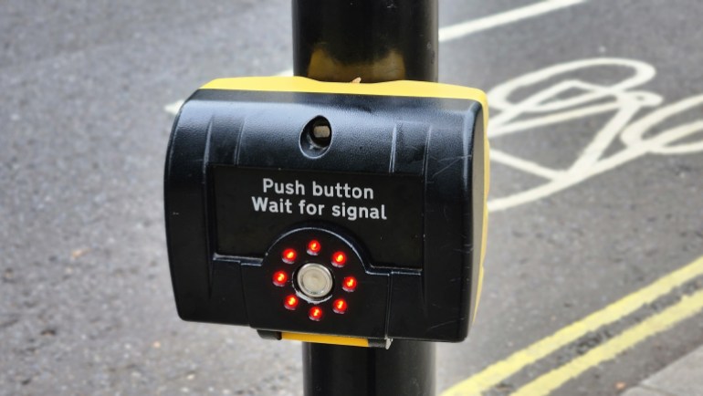 Pedestrian crossing button