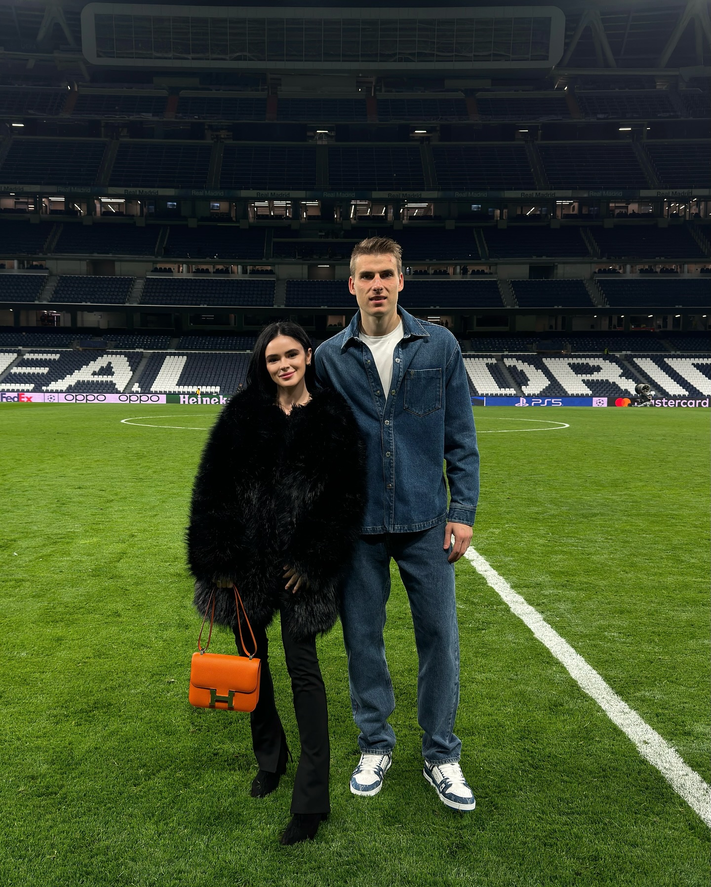 The pair broke the internet with their wedding pictures, which showed the goalie in a tracksuit