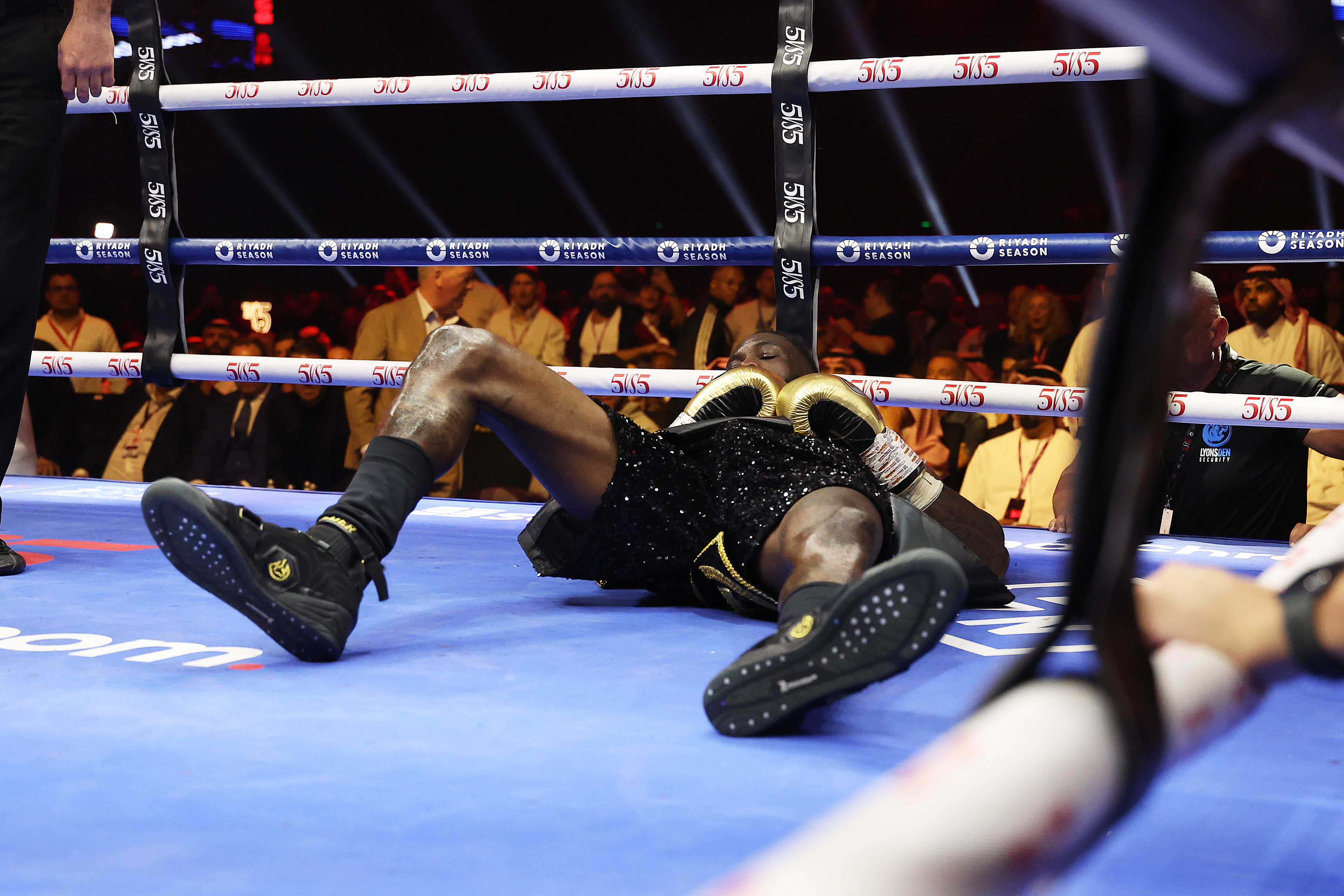 Wilder was sent flying to the canvas after being caught off guard