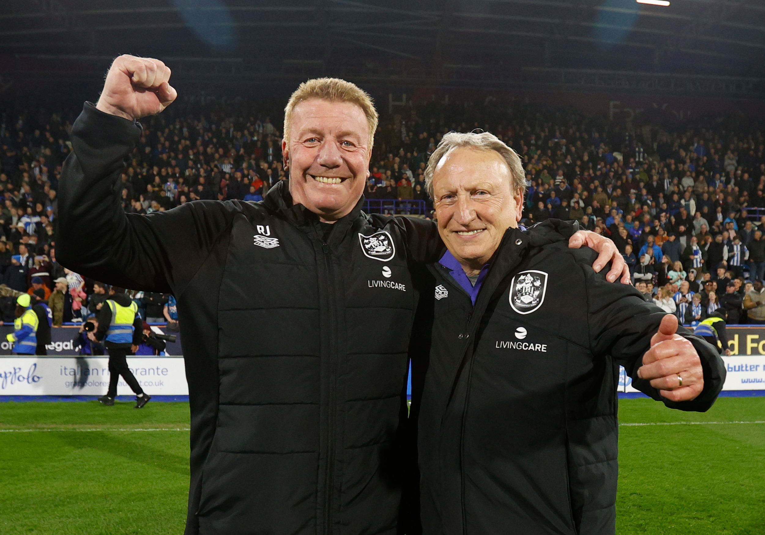 Neil Warnock and his long-term assistant Ronnie Jepson celebrate safety