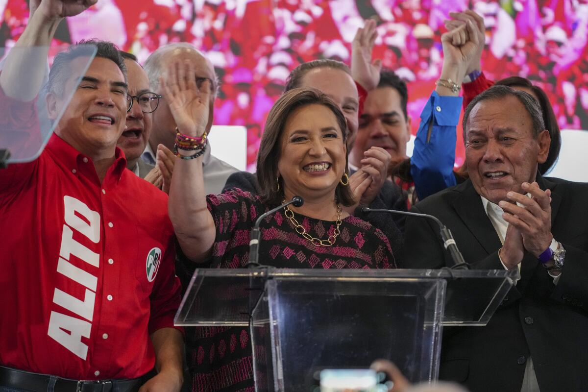 Xóchitl Gálvez Ruiz waves after polls closed.