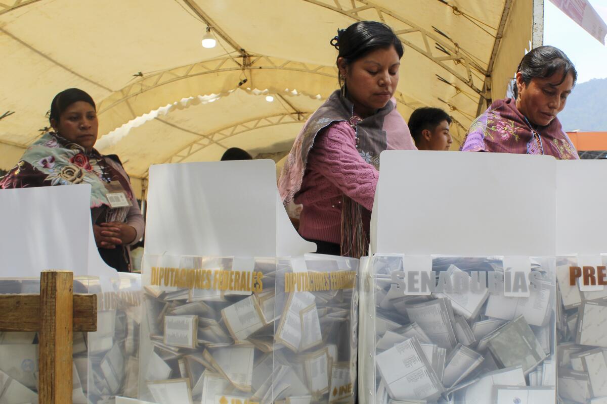 Indigenous women vote  in Zinacantan, Mexico.