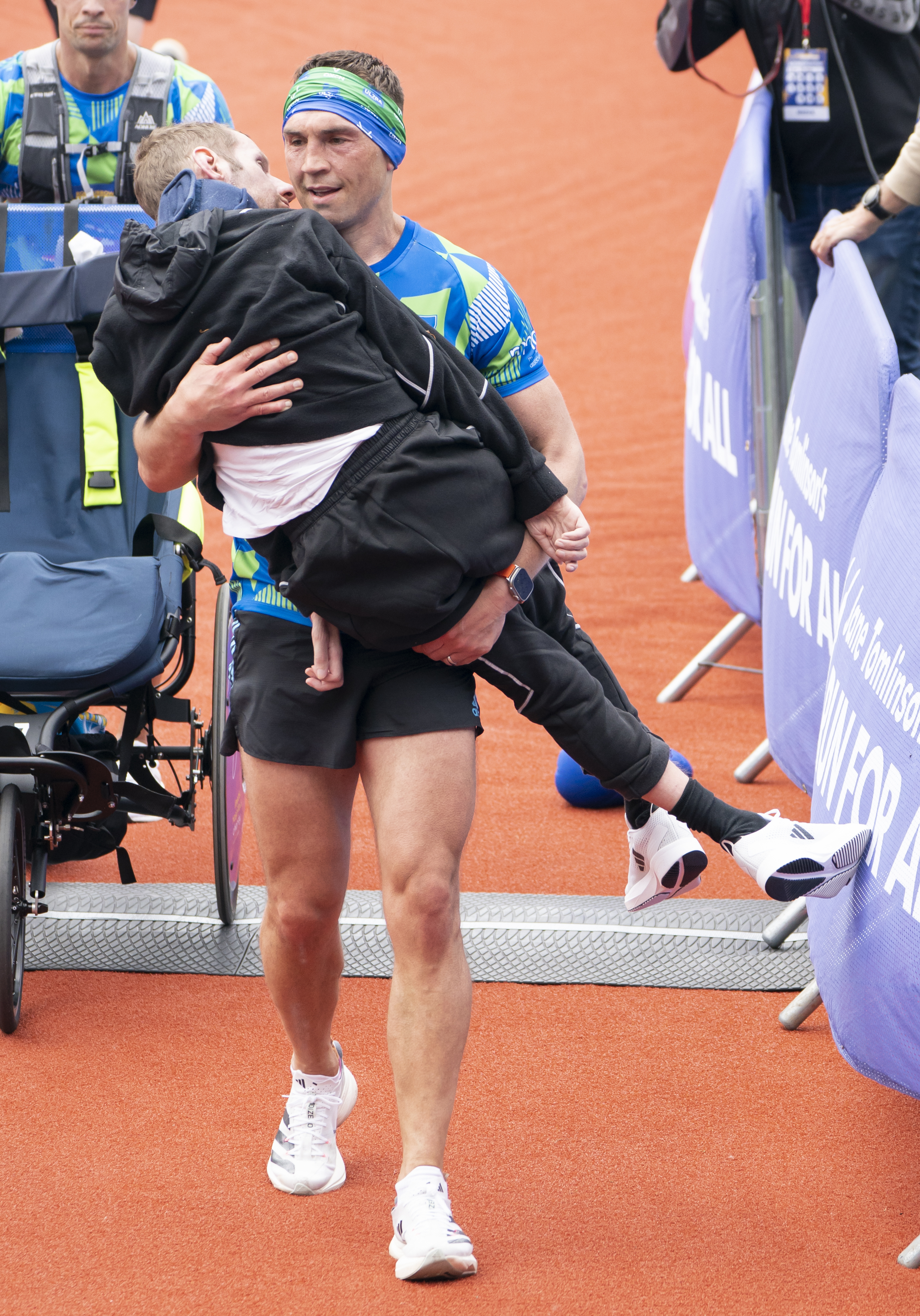 Pal Kevin Sinfield carried Rob over the finish line of the Leeds marathon