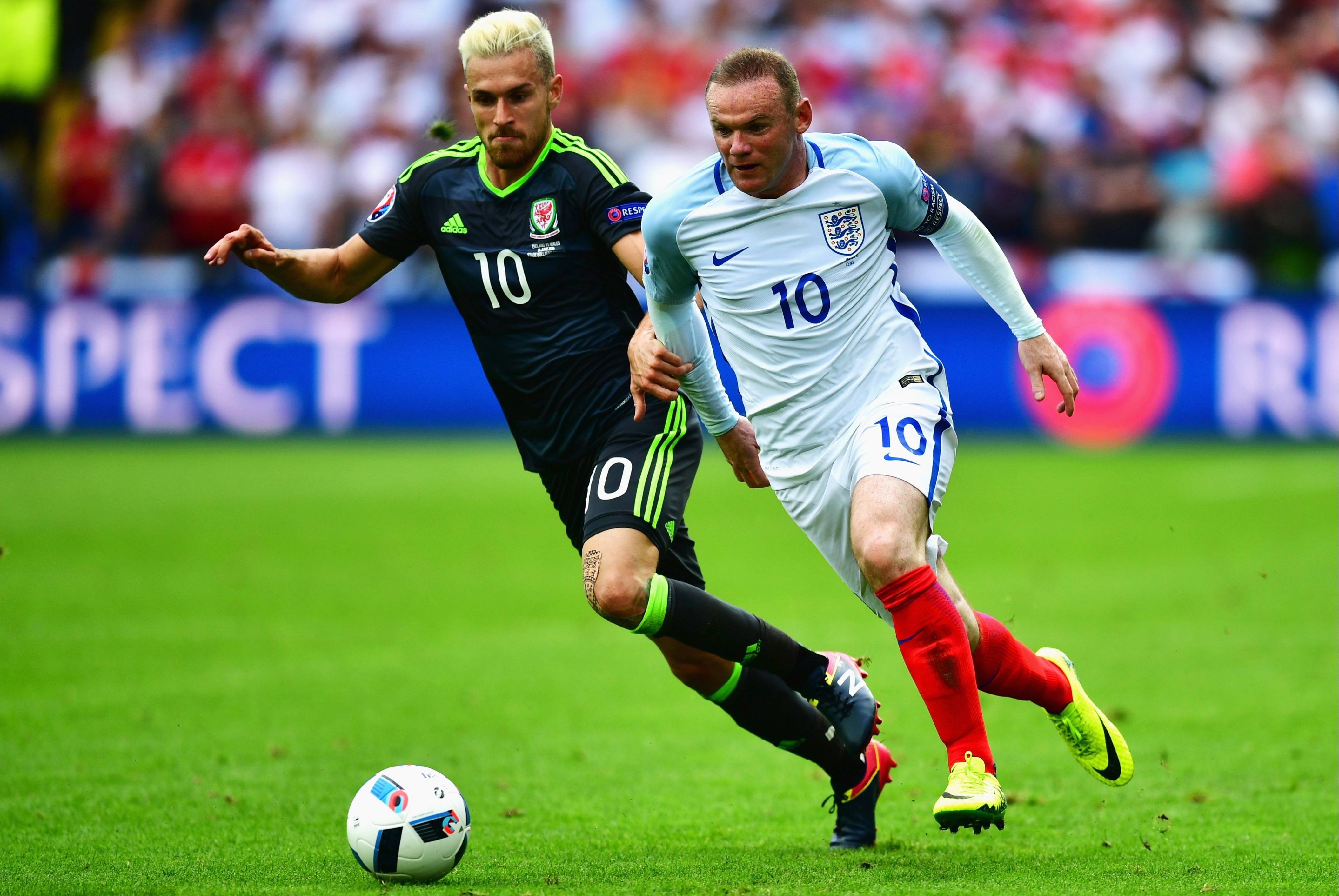 Wales' Aaron Ramsey, left, was in the drug testing room when Rooney smashed the TV