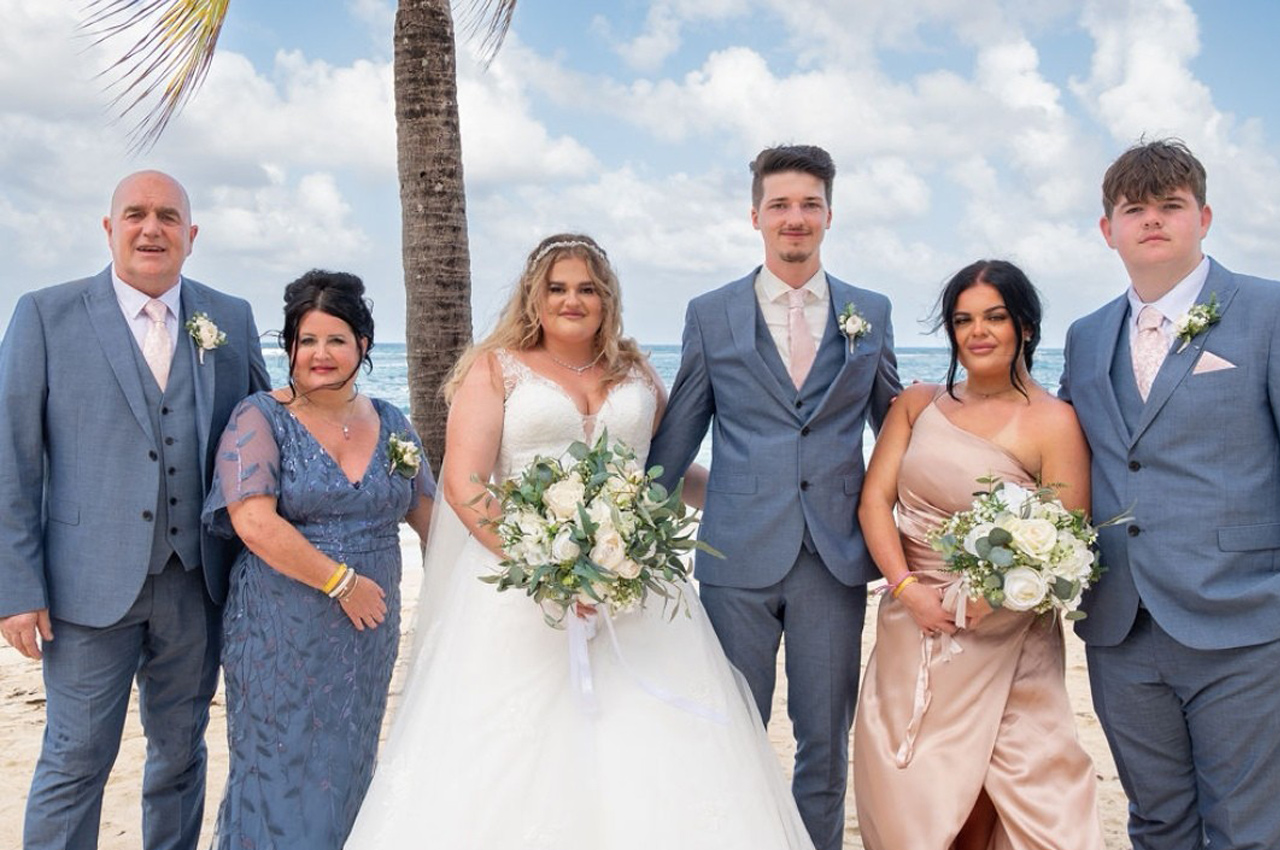 Peter, left, attends his daughter’s wedding in Jamaica