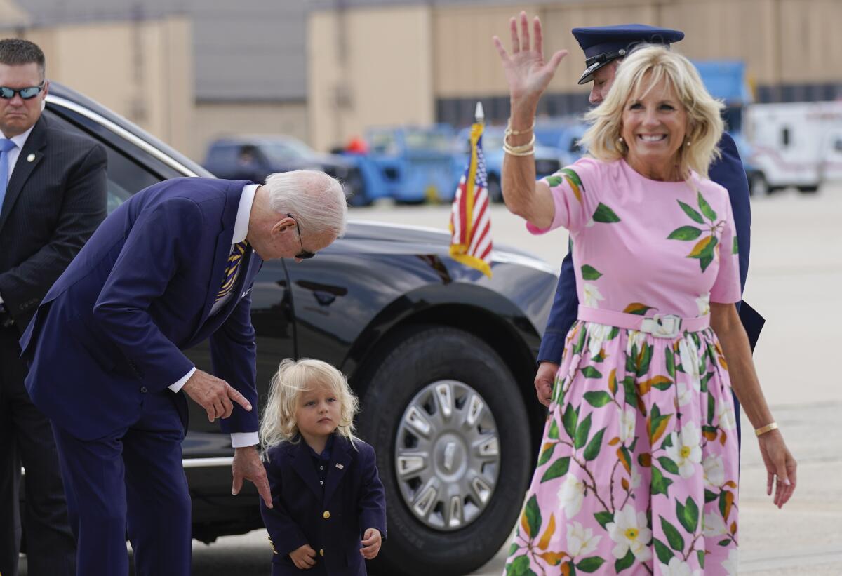 President Joe Biden with his grandson, Beau Biden, and First Lady Jill Biden in 2022.