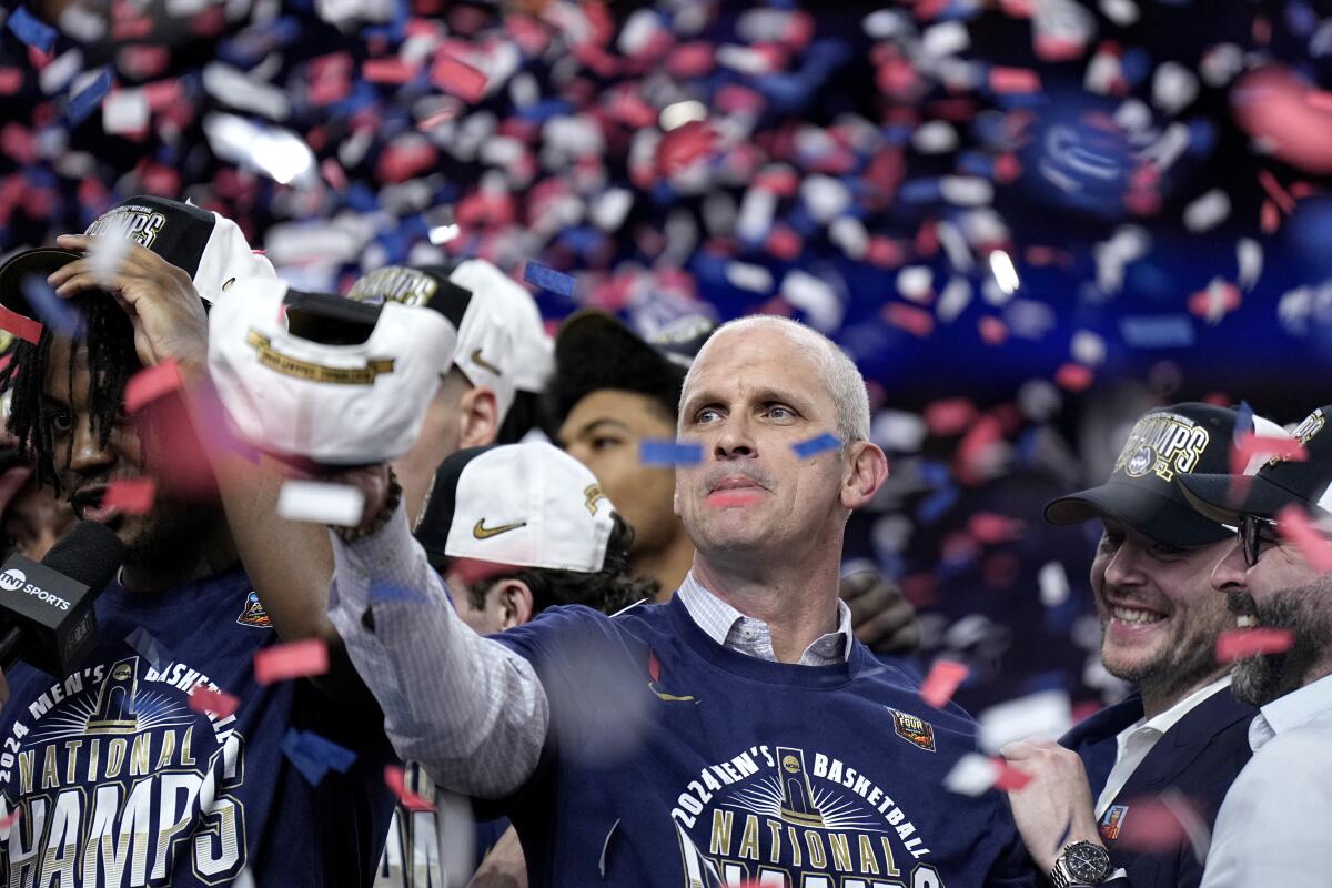 UConn head coach Dan Hurley celebrates after winning the NCAA title in April.