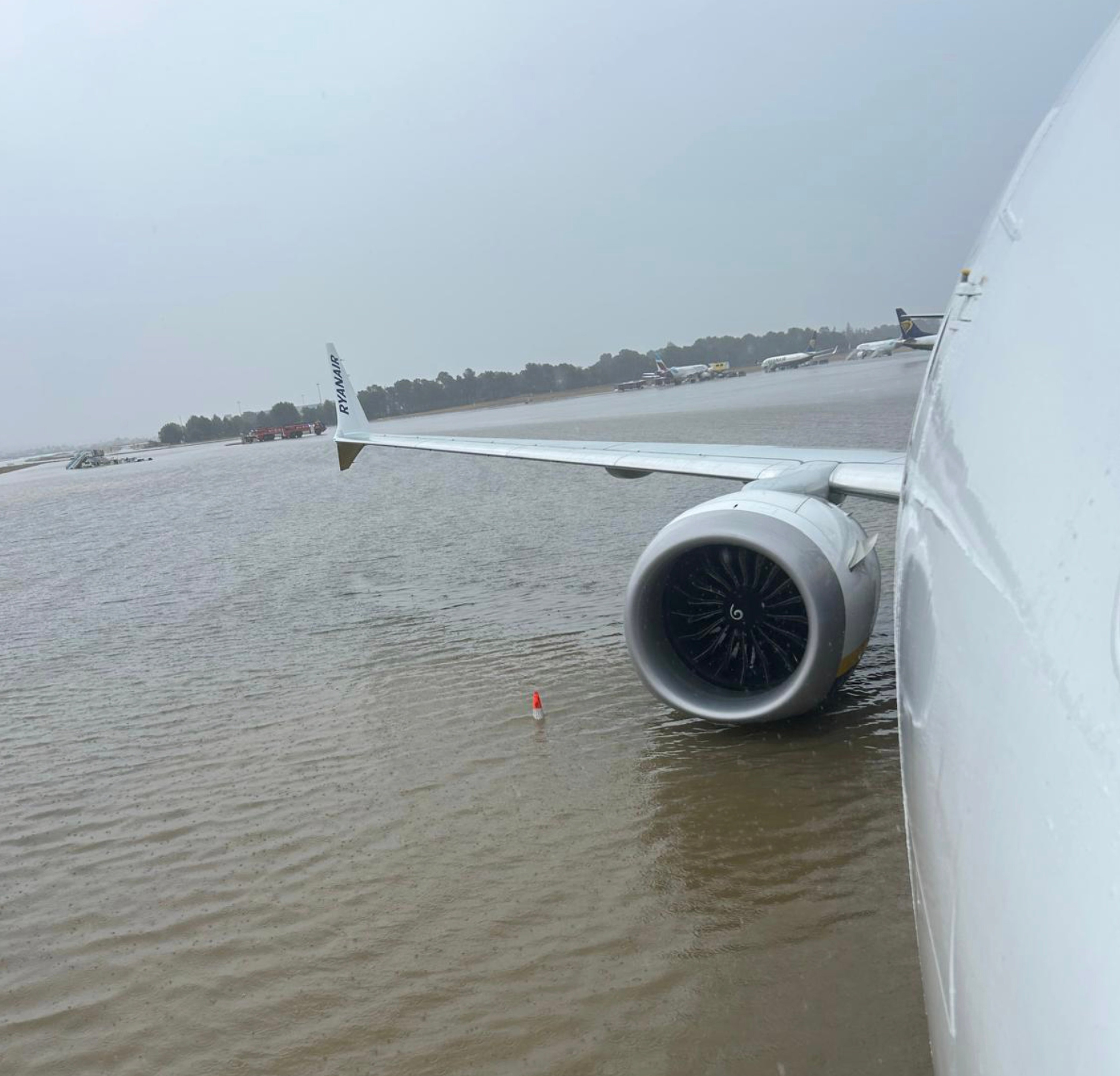 Images show planes on the flooded runways