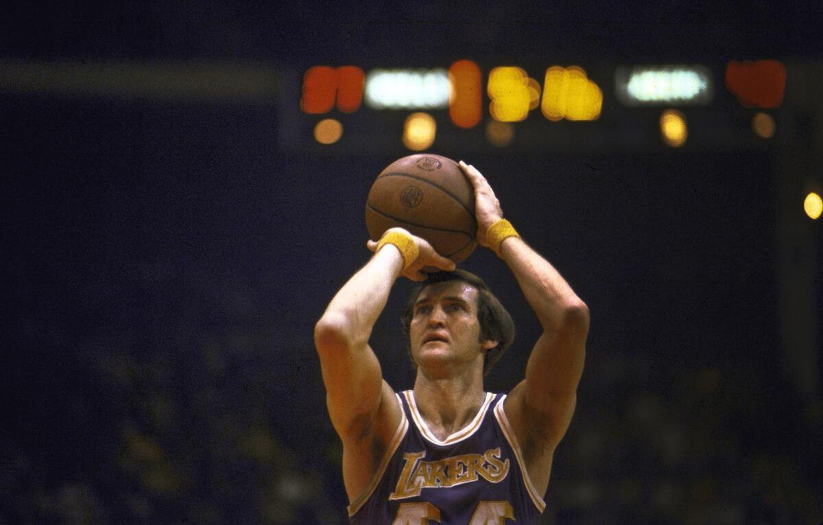 Lakers star Jerry West shoots a free throw during a 1973 game against the Chicago Bulls. 