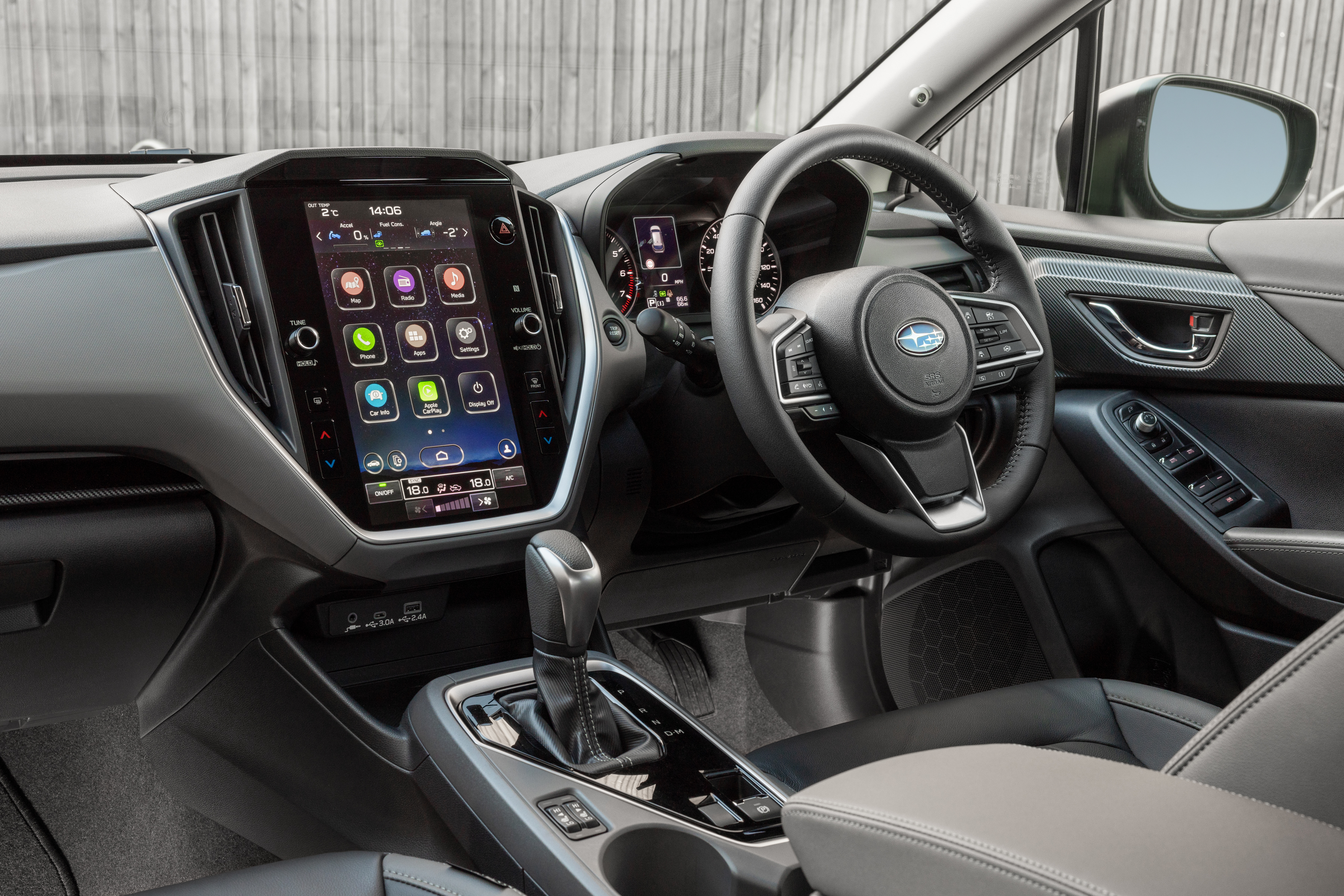 An almost Volvo-esque upright touchscreen dominates the centre of the dash