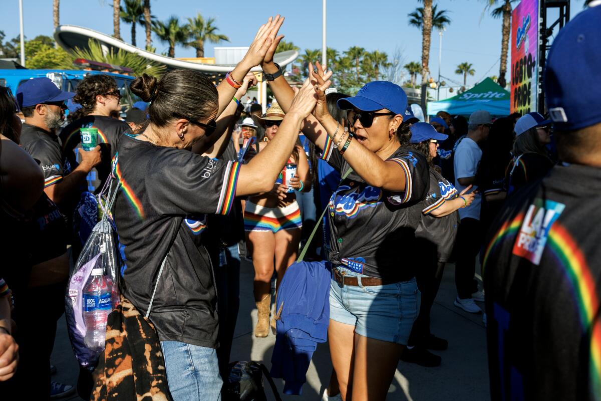 Dodgers fans enjoy Pride Night at Dodger Stadium.