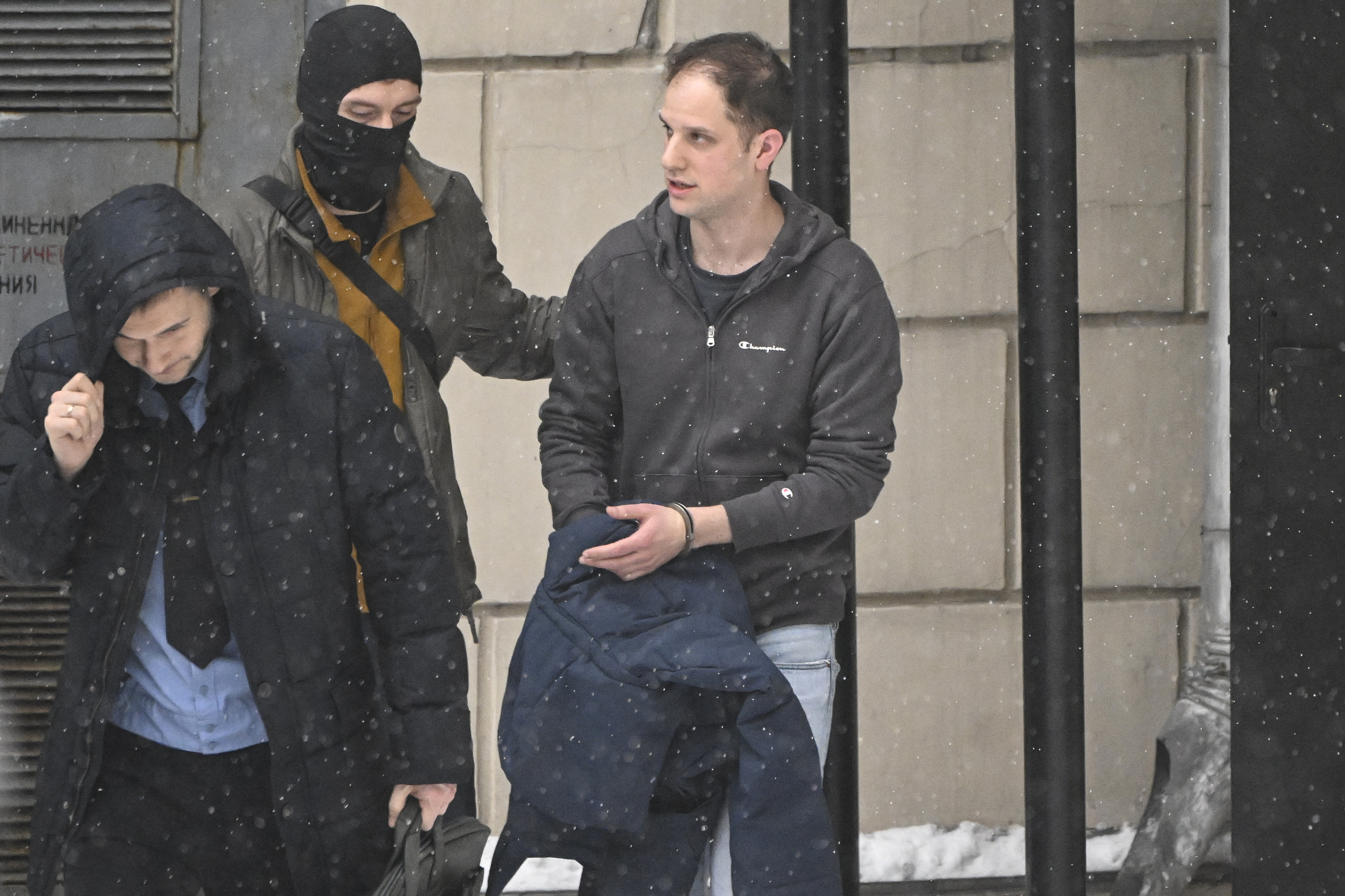 Gershkovich being escorted out of the Lefortovsky court in Moscow in January