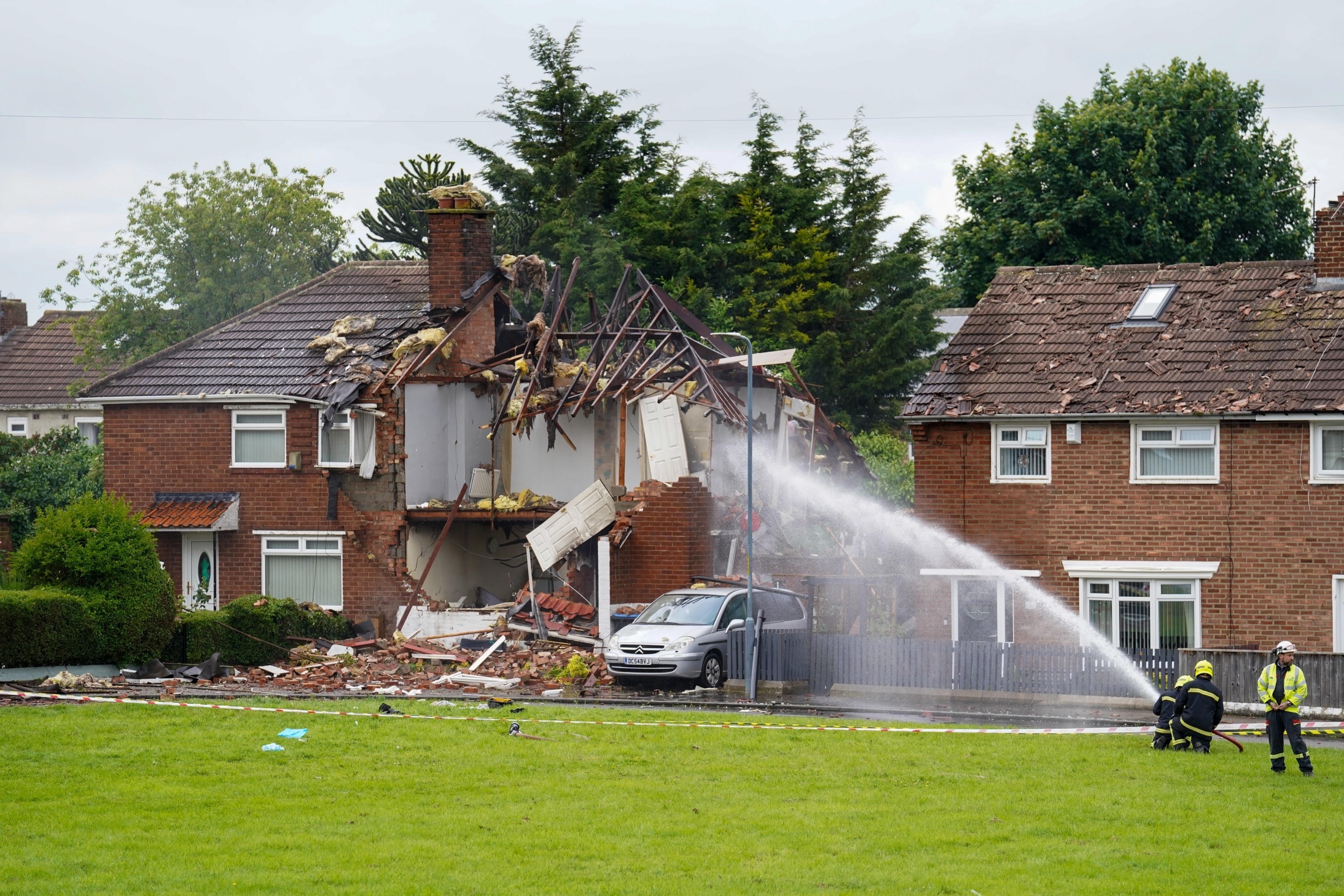 Firefighters sprayed water onto the home following the blast