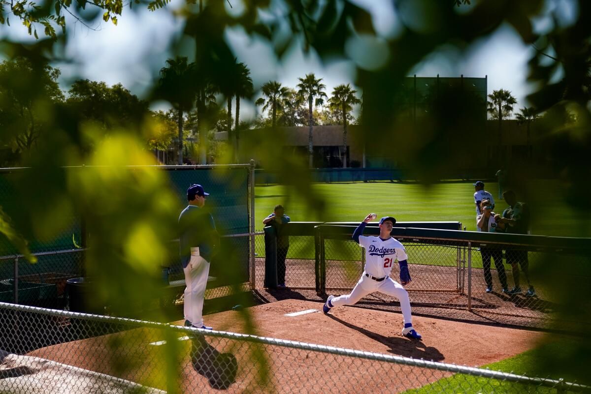 Dodgers pitcher Walker Buehler throws during spring training at Camelback Ranch in February 2020.