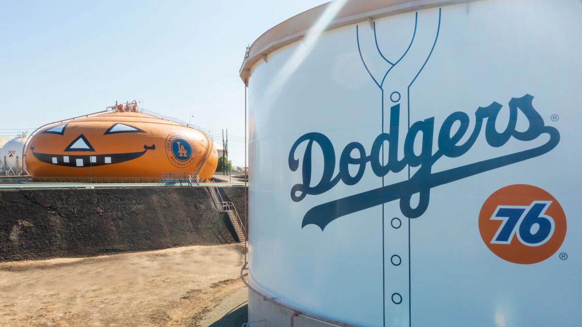 A tank at the Phillips 66 oil refinery in Wilmington is decorated with a Dodgers logo.