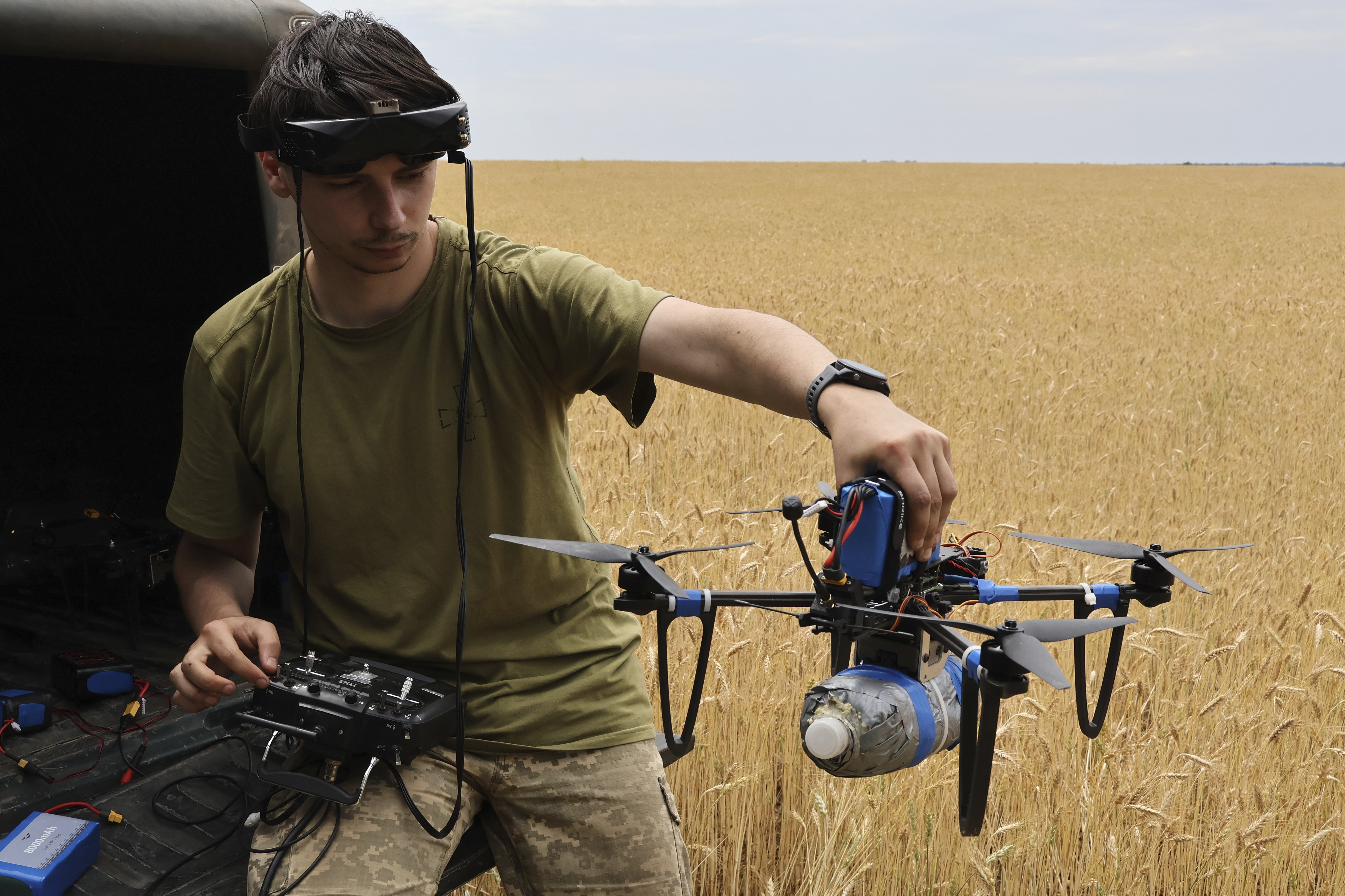 A Ukrainian serviceman of the Sky Hunters unit of the 65th brigade operates a drone on the front line in Zaporizhzhia region, Ukraine