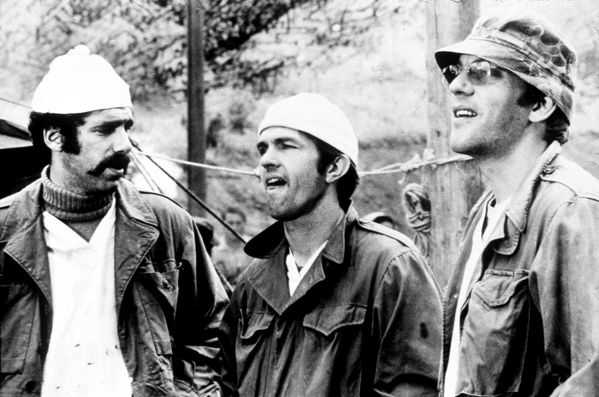 Elliott Gould, Tom Skerritt and Donald Sutherland in a scene from "MASH."