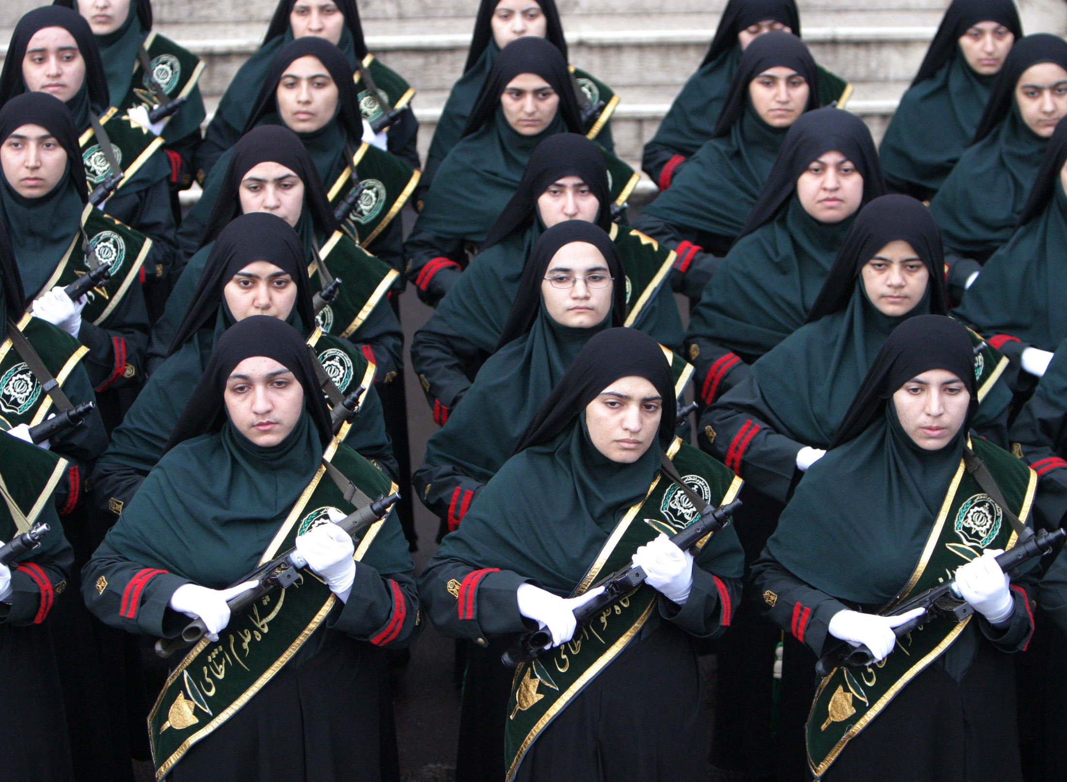 Iranian female police cadets stand during a graduation ceremony in Tehran, 2005