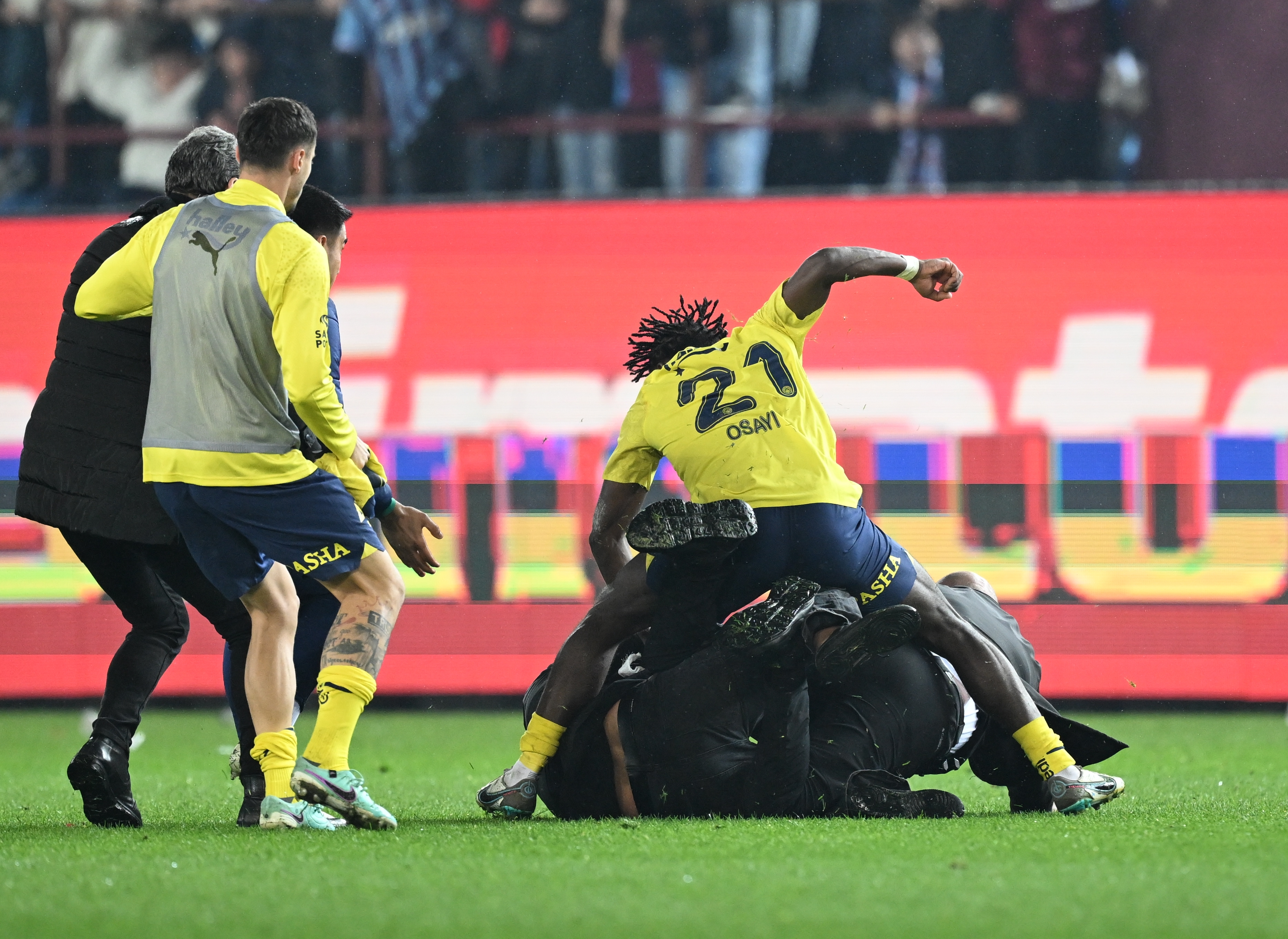 Fenerbahce players were seen fighting back after they were attacked