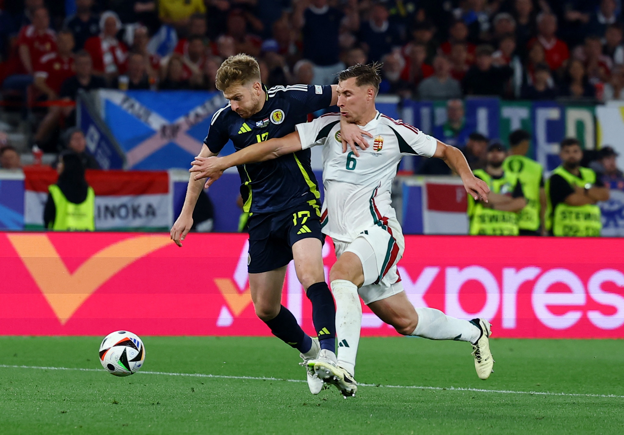 Scotland thought they deserved a penalty when Stuart Armstrong was brought down by Victor Orban