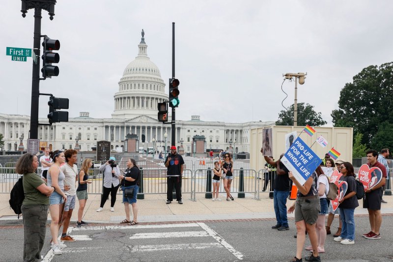 Pro-abortion advocates and Pro-life advocates argue in front of the U.S. Capitol in the aftermath of the overturning of Roe v. Wade, which ended federal abortion protection making abortion regulation an issue decided by individual states at the U.S. Supreme Court in Washington, D.C., on June 27 2022. File Photo by Jemal Countess/UPI