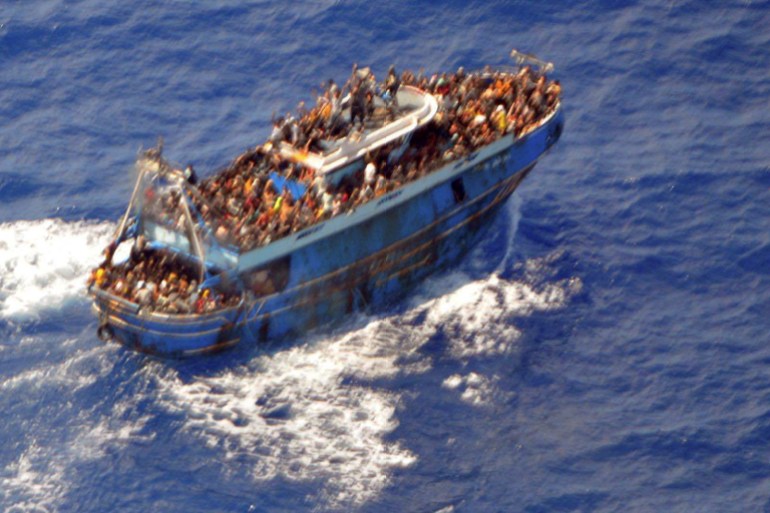 A undated handout photo provided by the Hellenic Coast Guard shows migrants onboard a boat during a rescue operation, before their boat capsized on the open sea, off Greece, June 14, 2023. Hellenic Coast Guard/Handout via REUTERS ATTENTION EDITORS - THIS IMAGE HAS BEEN SUPPLIED BY A THIRD PARTY.