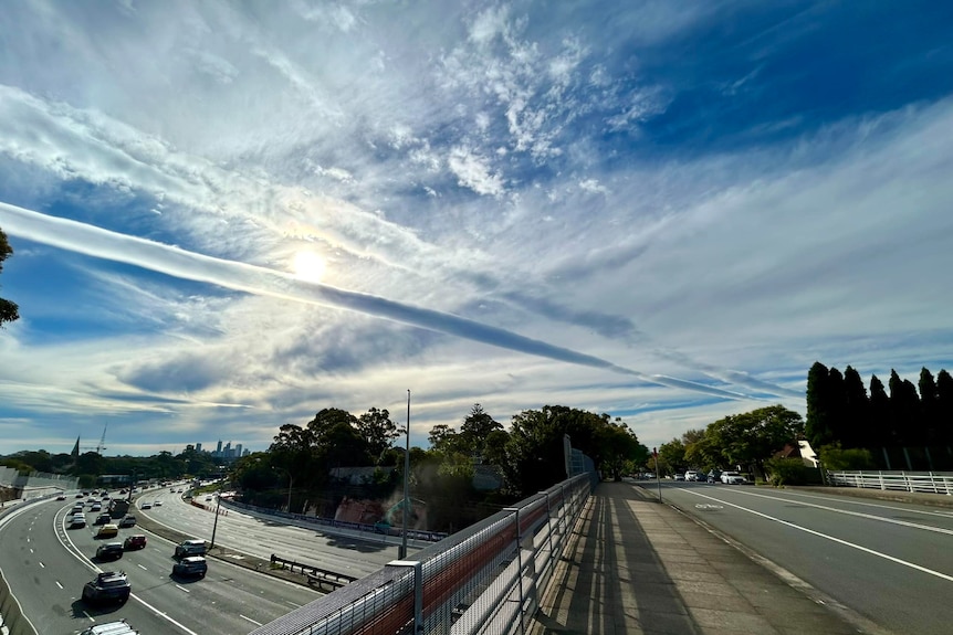 Roll clouds stretch over a highway in Sydney.