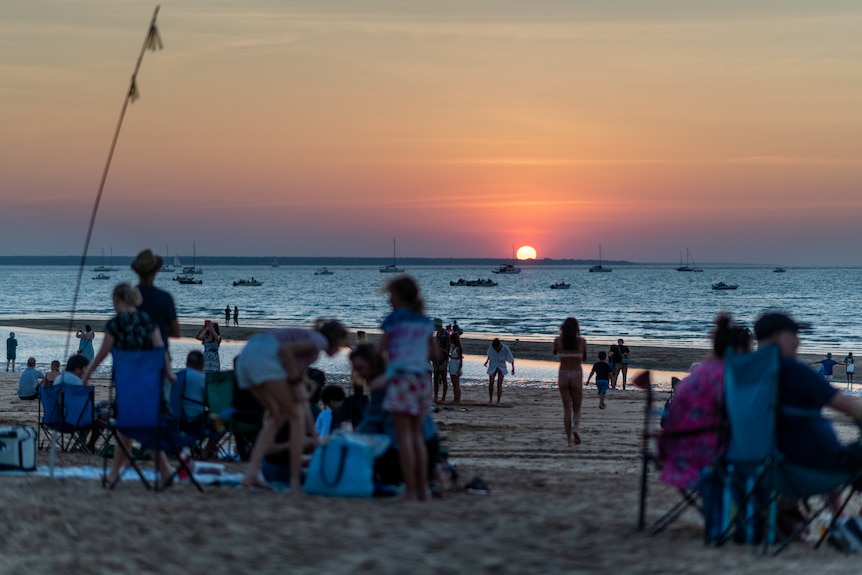 Mindil Beach is seen with many people on it on Territory Day 2021.