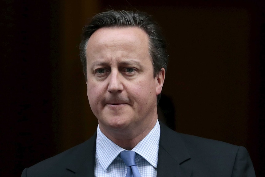 David Cameron looks grim.