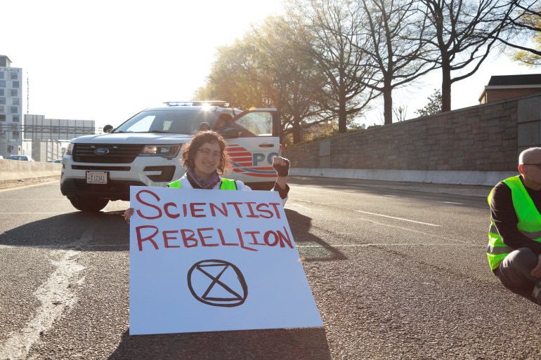 A few days after her arrest outside the White House, Abramoff joins a local activist group in shutting down a major highway running through DC to bring attention to the climate crisis at hand (2022)